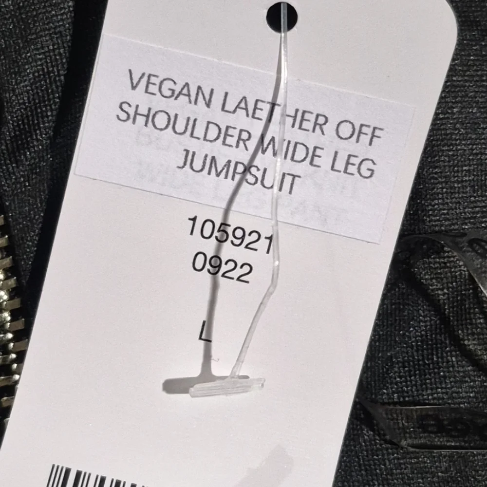 Bebe Black Jumpsuit with Vegan Leather Detail